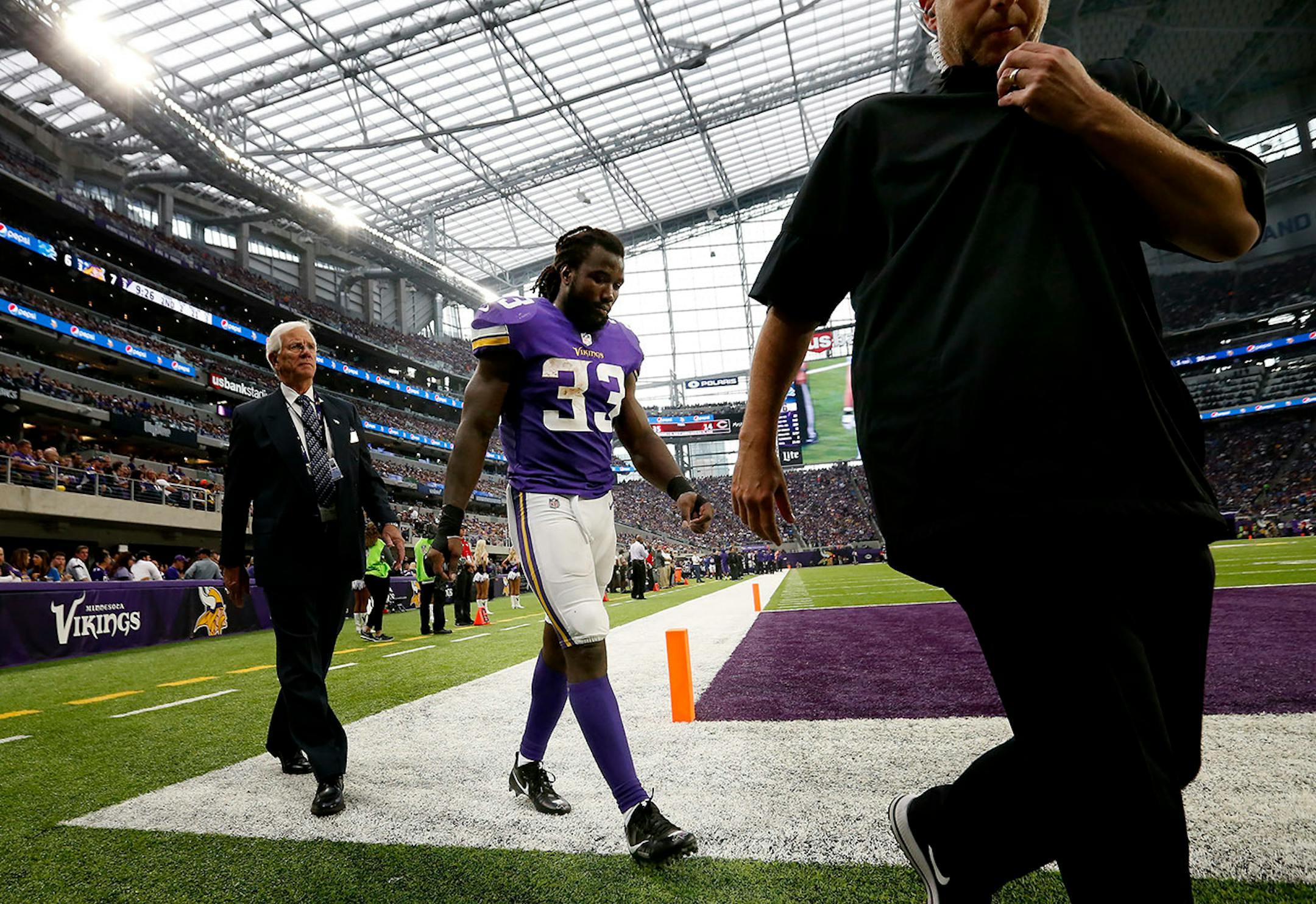Minnesota Vikings running back Dalvin Cook (33) walked to the locker room in the third quarter. Cook was injured on a run and did not return to the game.