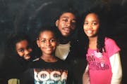 Ny'kia Williams, far right, with her dad, Maurice Verser, and her siblings, Maurice and Renee