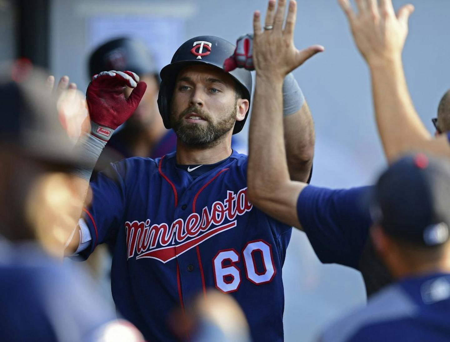 Jake Cave was congratulated in the dugout after hitting a solo home run off former Cleveland starting pitcher Trevor Bauer on July 13