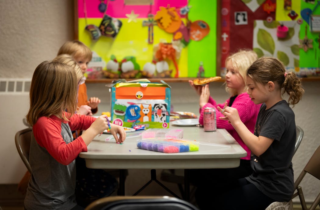 Children ate pizza and made crafts during a lice party in St. Paul last month.