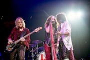 Aerosmith singer Steven Tyler, flanked by bassist Tom Hamilton and guitarist Joe Perry, performed in Philadelphia last fall before postponing other da