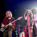 Aerosmith singer Steven Tyler, flanked by bassist Tom Hamilton and guitarist Joe Perry, performed in Philadelphia last fall before postponing other da