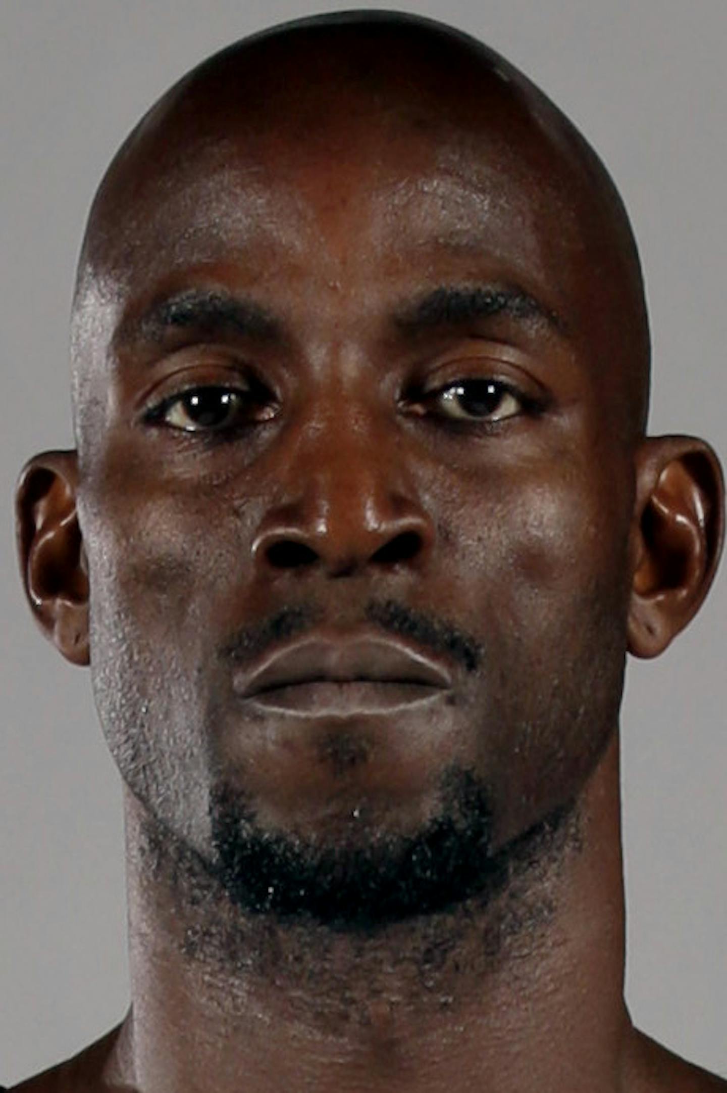 Kevin Garnett poses for photos during the Brooklyn Nets media day, at the Barclay's Center, in New York, Monday, Sept. 30, 2013. (AP Photo/Richard Drew) ORG XMIT: NYOTK