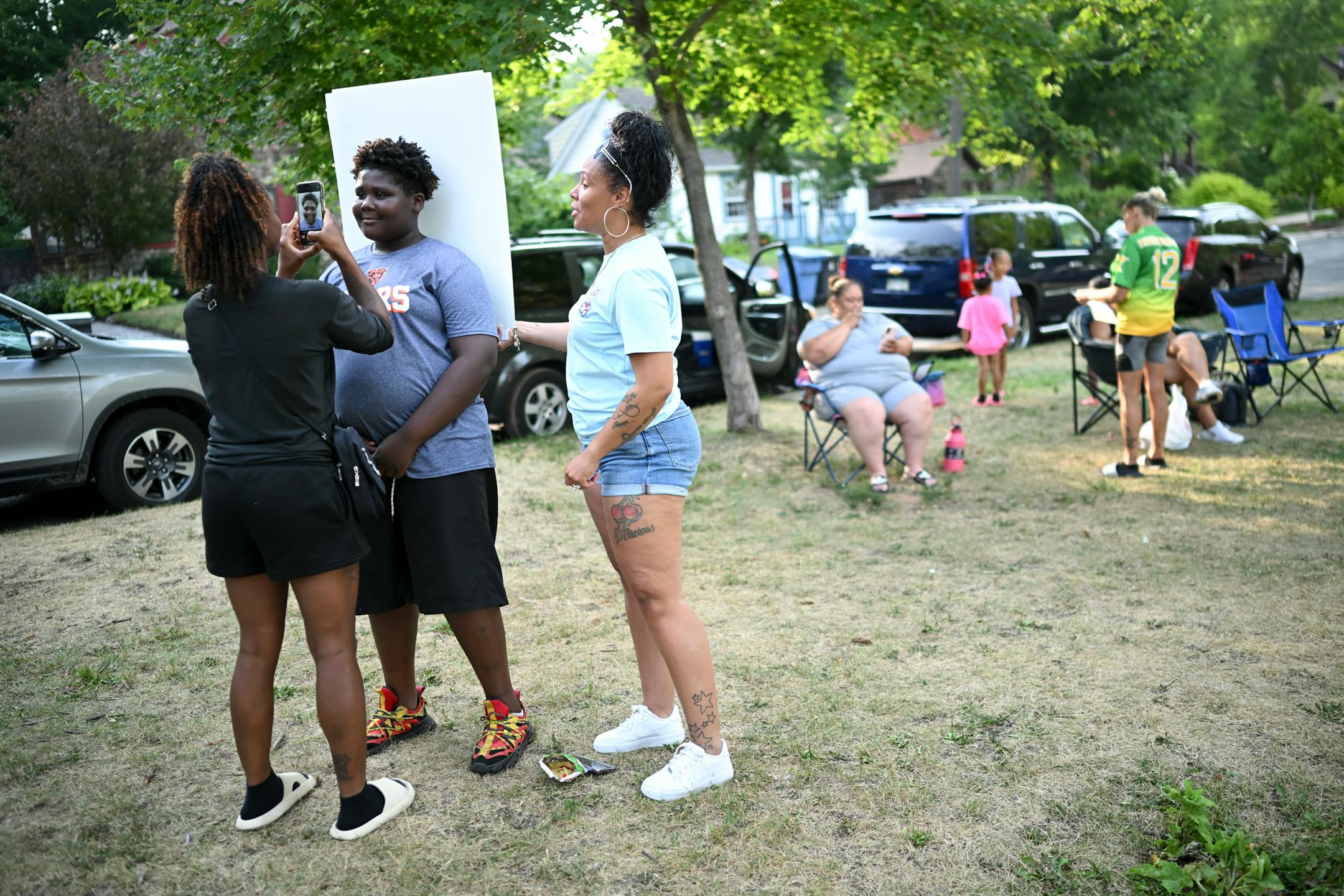 CJ Johnson, 10, who says he witnessed a shooting three years ago during practice, has his photo taken.