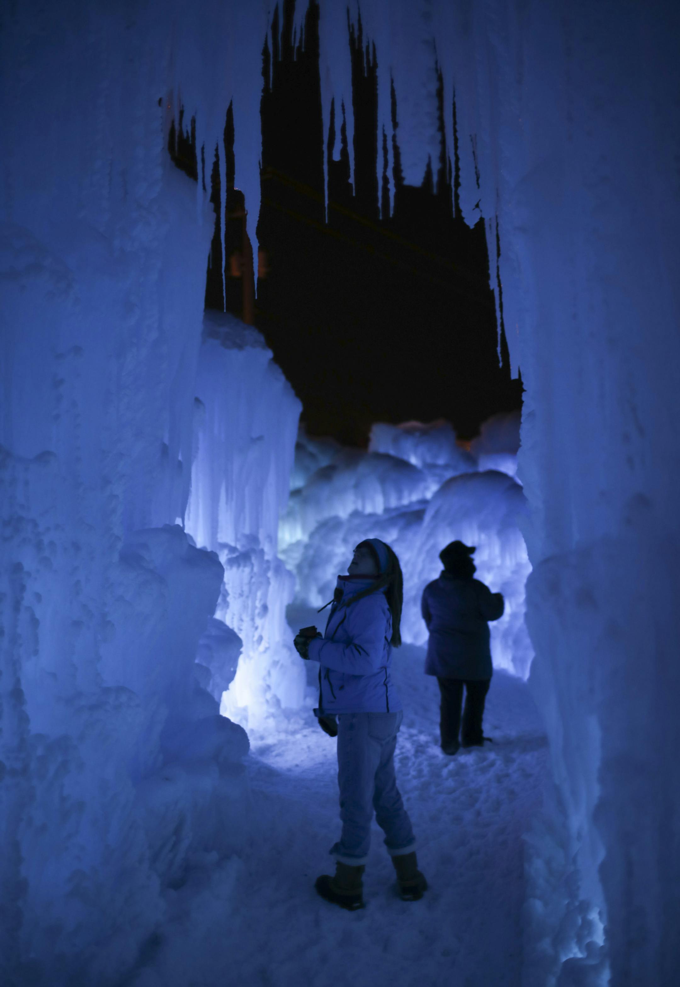 Visitors inside the Ice Castles at the Lift Bridge Sunday night. ] JEFF WHEELER &#xef; jeff.wheeler@startribune.com The town of Stillwater is hosting Ice Castles at the Lift Bridge in Lowell Park from now until as late as March, depending on the weather. The frozen spectacle is open daily afternoons and evenings, except Tuesdays.