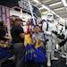 Star Wars fans shop at a toy store at midnight in Hong Kong, Friday, Sept. 4, 2015 as part of the global event called "Force Friday" to release new St