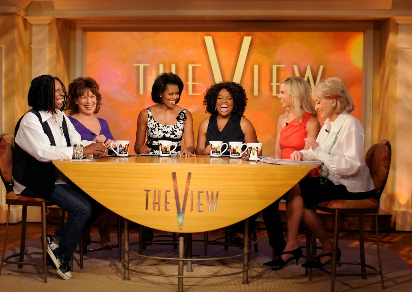 This handout photo provided by ABC shows Michelle Obama, wife Democratic presidential candidate Sen. Barack Obama, D-Ill., third from left, on the set of "The View," Wednesday, June 18, 2008 in New York. From left are, Whoopi Goldberg, Joy Behar, Mrs. Obama, Sherri Shepard, Barbara Walters and Elisabeth Hasselbeck.