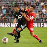 Minnesota United star Emanuel Reynoso, left, has played in only one of the team's six MLS matches this season.