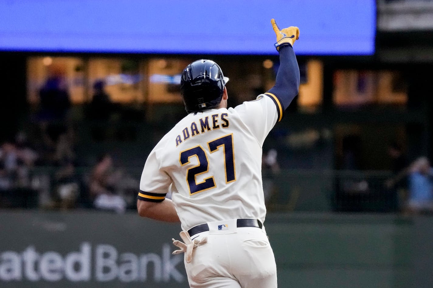 Milwaukee Brewers' Willy Adames celebrates after hitting a two-run home run during the first inning of a baseball game against the Minnesota Twins Tuesday, Aug. 22, 2023, in Milwaukee. (AP Photo/Morry Gash)