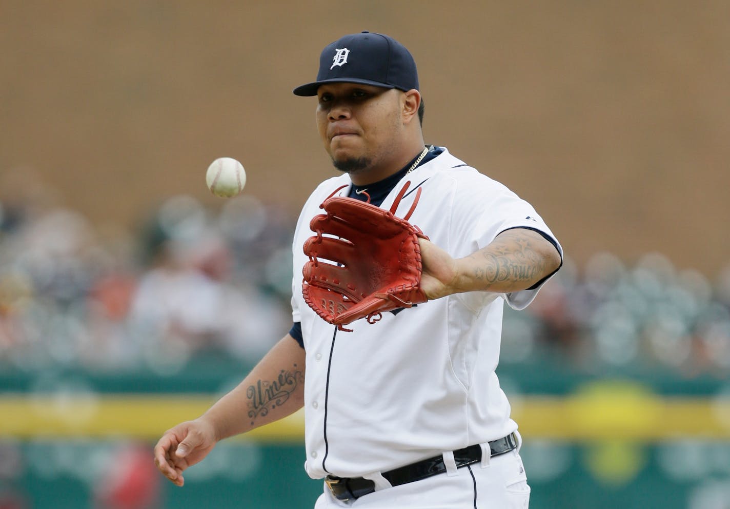 Detroit Tigers relief pitcher Bruce Rondon waits on a new ball during the ninth inning of a baseball game against the Los Angeles Angels, Thursday, Aug. 27, 2015, in Detroit. (AP Photo/Carlos Osorio)