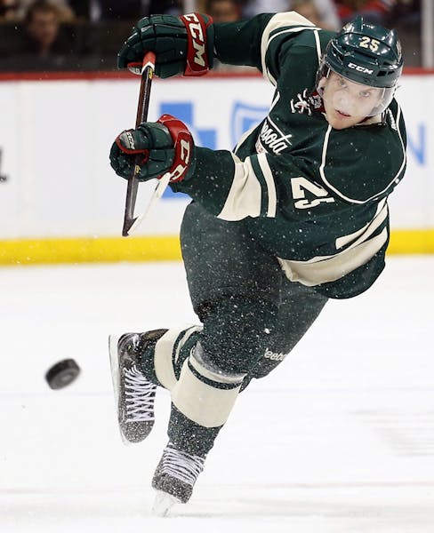 The Minnesota Wild's Jonas Brodin shoots in the first period against the Chicago Blackhawks at Xcel Energy Center in St. Paul, Minnesota, on Tuesday, 