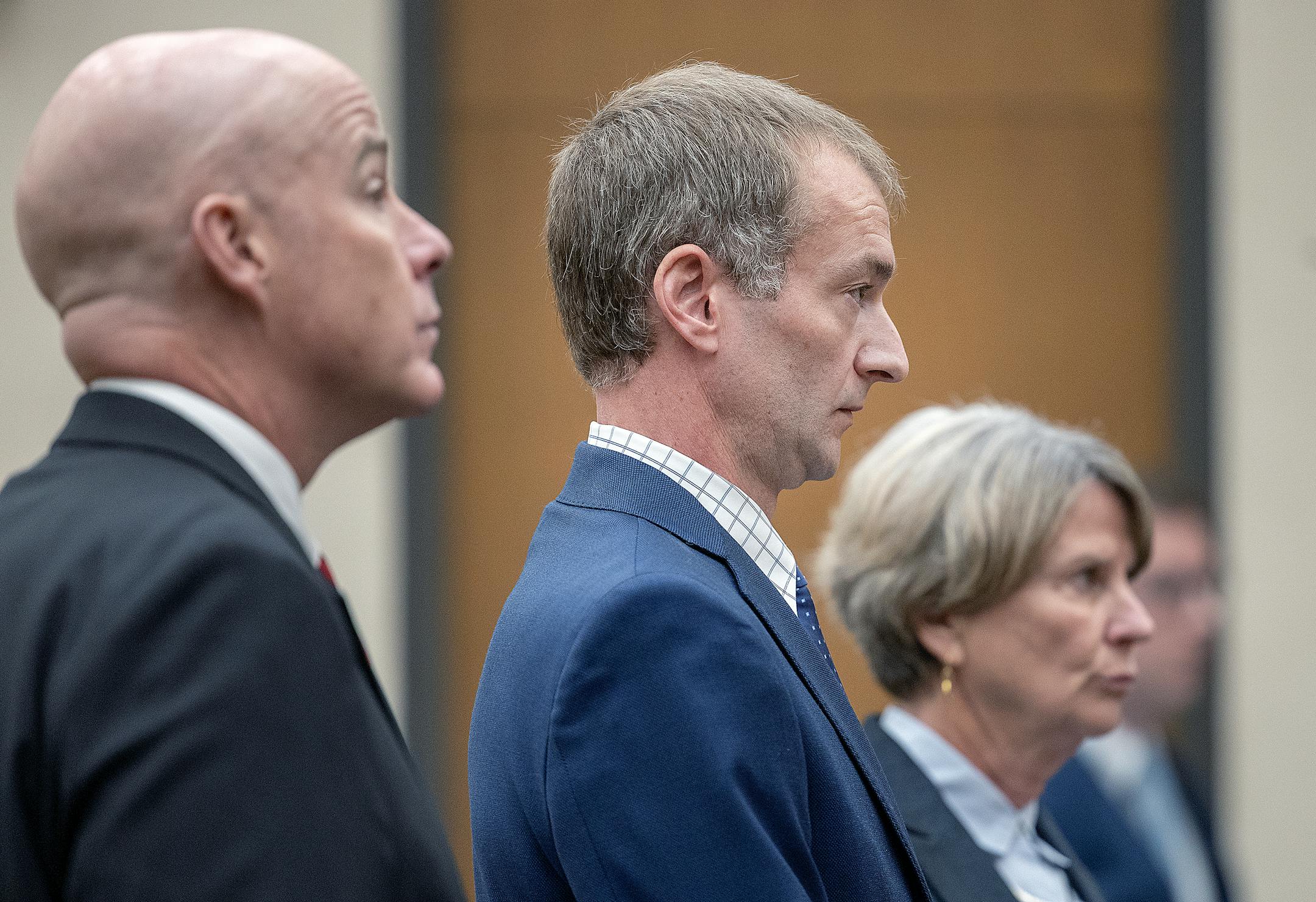 Flanked by his attorneys&nbsp;Thomas Plunkett, left, and Deborah Ellis,&nbsp;ex-Minneapolis police officer Brian Cummings listens to Judge Tamara Garcia during his sentencing in her courtroom at the Hennepin Government Center.