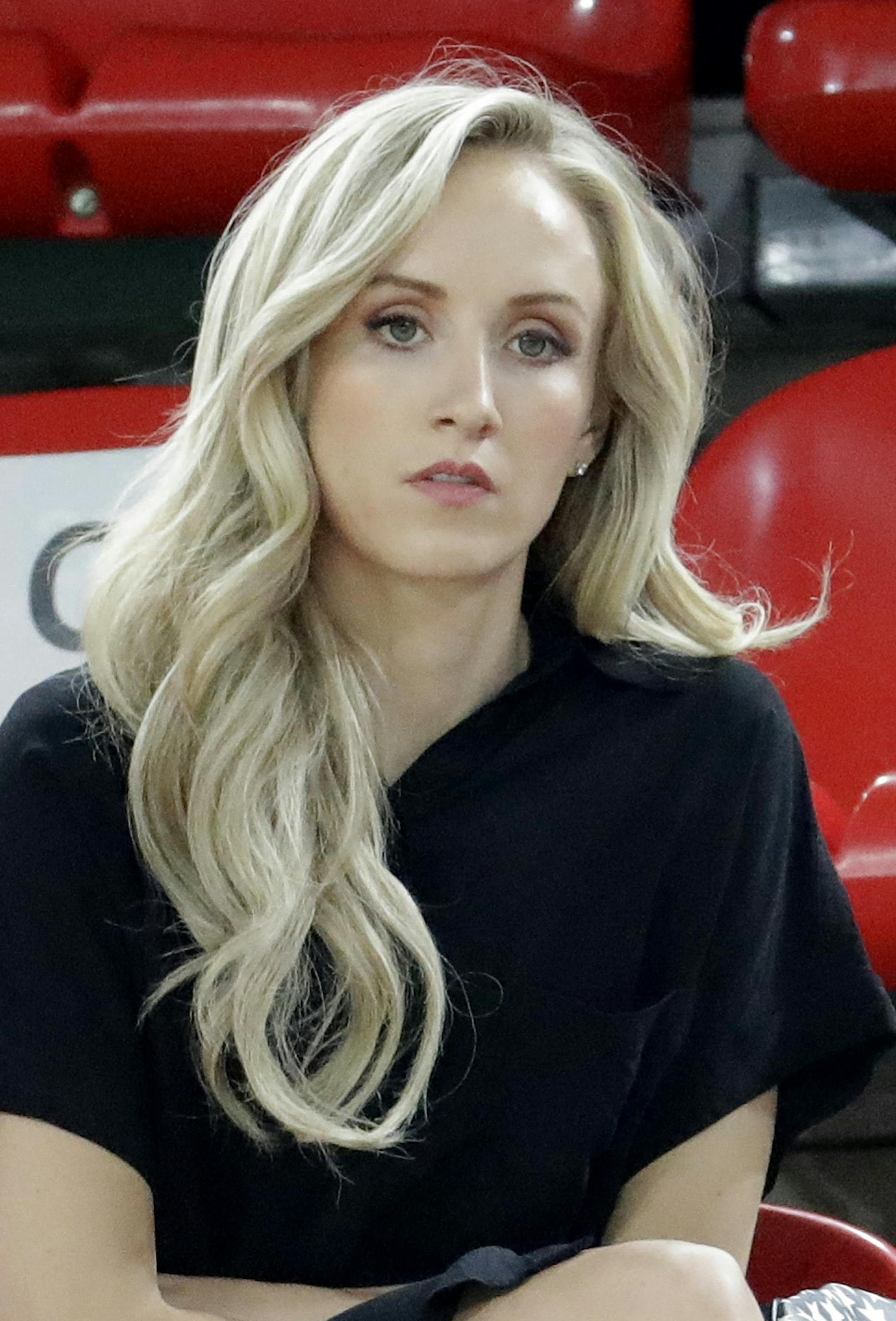 Former United States' gymnast Nastier Liukin watches gymnasts practice their routines for the rhythmic gymnastics at the 2016 Summer Olympics in Rio de Janeiro, Brazil, Thursday, Aug. 18, 2016. (AP Photo/Julio Cortez) ORG XMIT: MIN2016092318431471