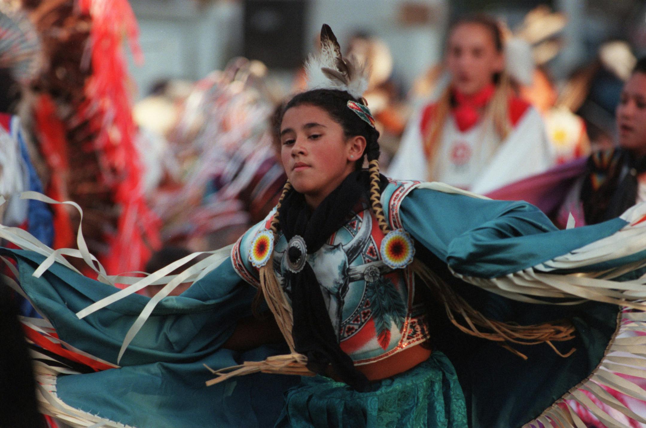 A fancy shawl dancer spreads her wings at the Dakota Traditional Wacipi at Upper Sioux Agency State Park in western Minnesota.