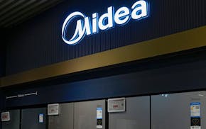 FILE - Midea's fridges are seen at an electronic shop in Beijing on Nov. 15, 2021.