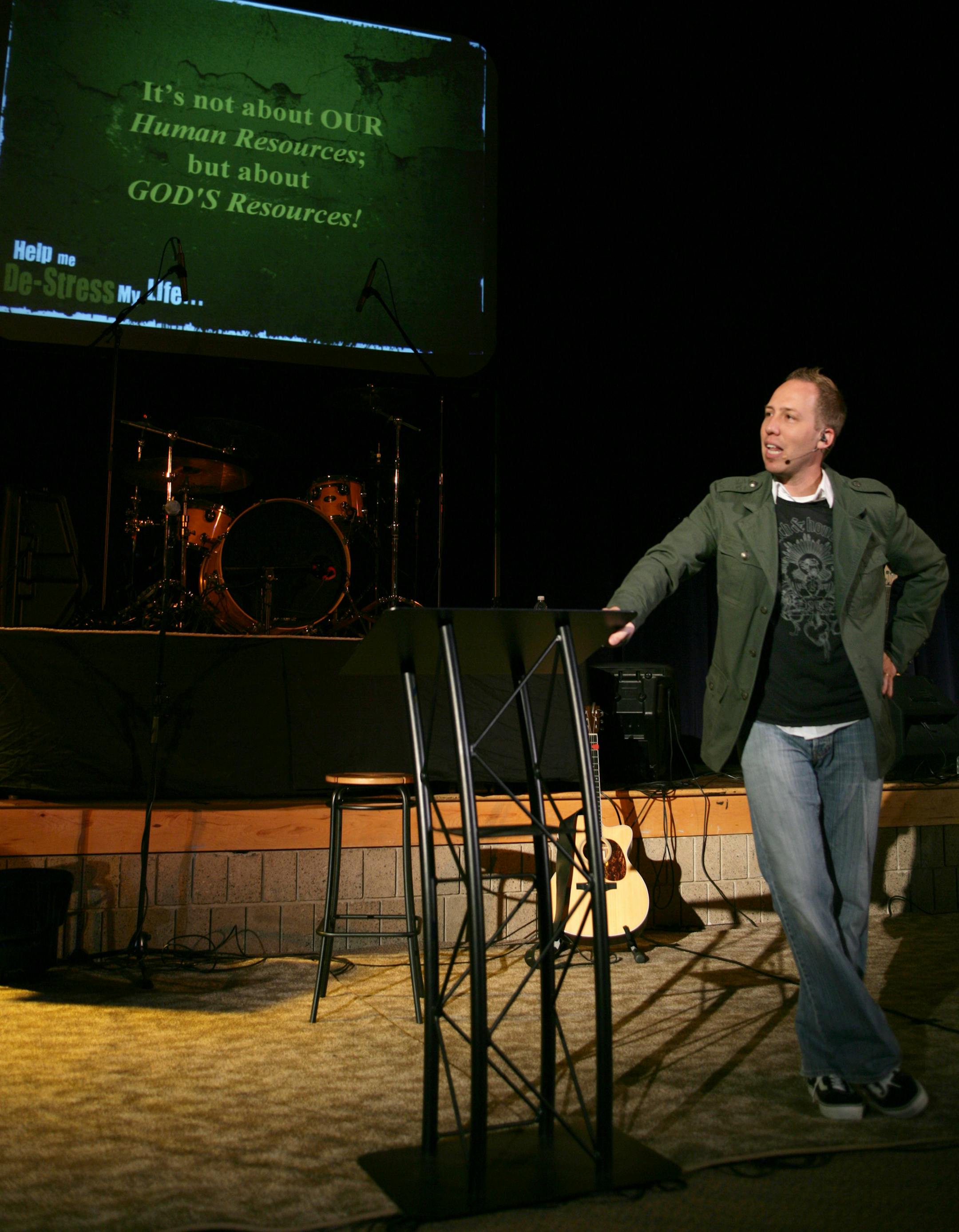 Pastor Peter Haas gives his sermon at Substace Church in the auditorium of Fridley High School. About 650 people watched his sermon about de-stessing you life. The explosion of Gen X and Gen Y churches. This church, called Substance (they tend to have radical names,) is one of the most-successful in the Twin Cities, drawing several hundred worshippers each Sunday. They reach out to young people by cutting back on the ritual of traditional churches. There's also a rock band and multi-media.