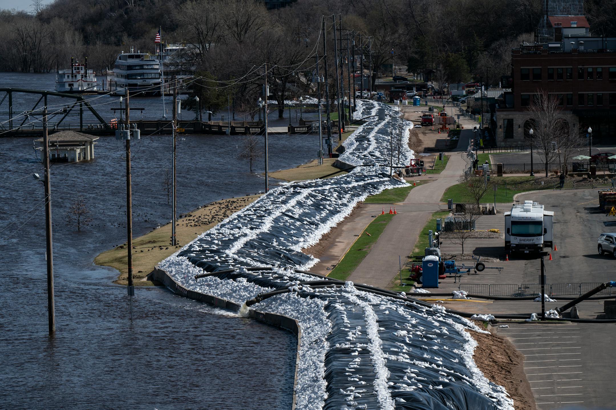 A dike is in place along the St. Croix River Monday, April 17, 2023 in Stillwater, Minn.