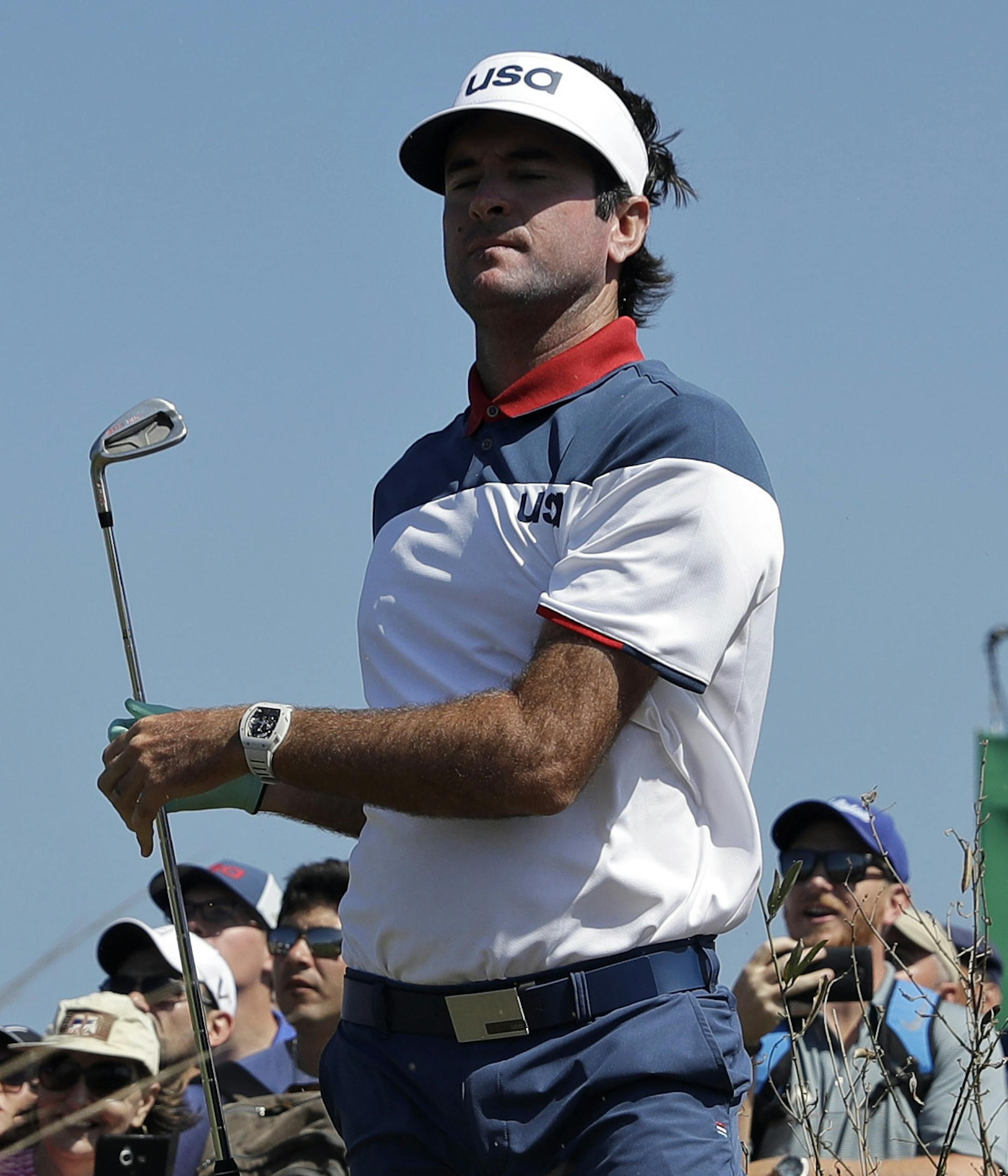 Bubba Watson of the United States, hits from the rough on the 9th hole during the third round of the men's golf event at the 2016 Summer Olympics in Rio de Janeiro, Brazil, Saturday, Aug. 13, 2016. (AP Photo/Alastair Grant) ORG XMIT: OGLF258