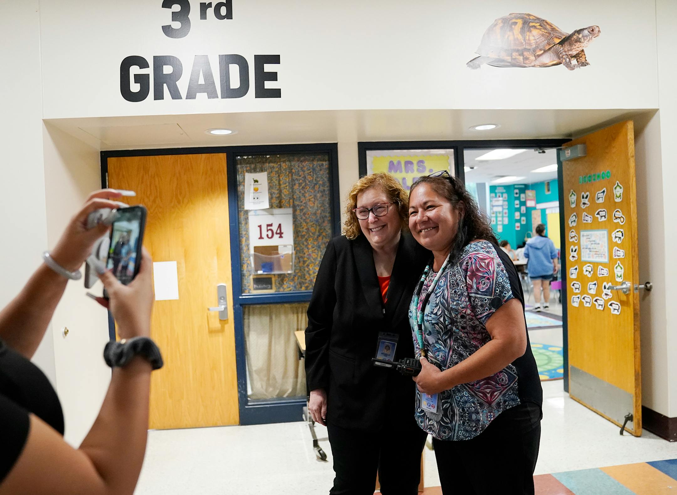 Interim Minneapolis Public Schools Superintendent Rochelle Cox and Anishinabe Academy principal Laura Sullivan posed for a photo at Anishinabe Academy as Cox toured the school on the first day of school in Minneapolis.