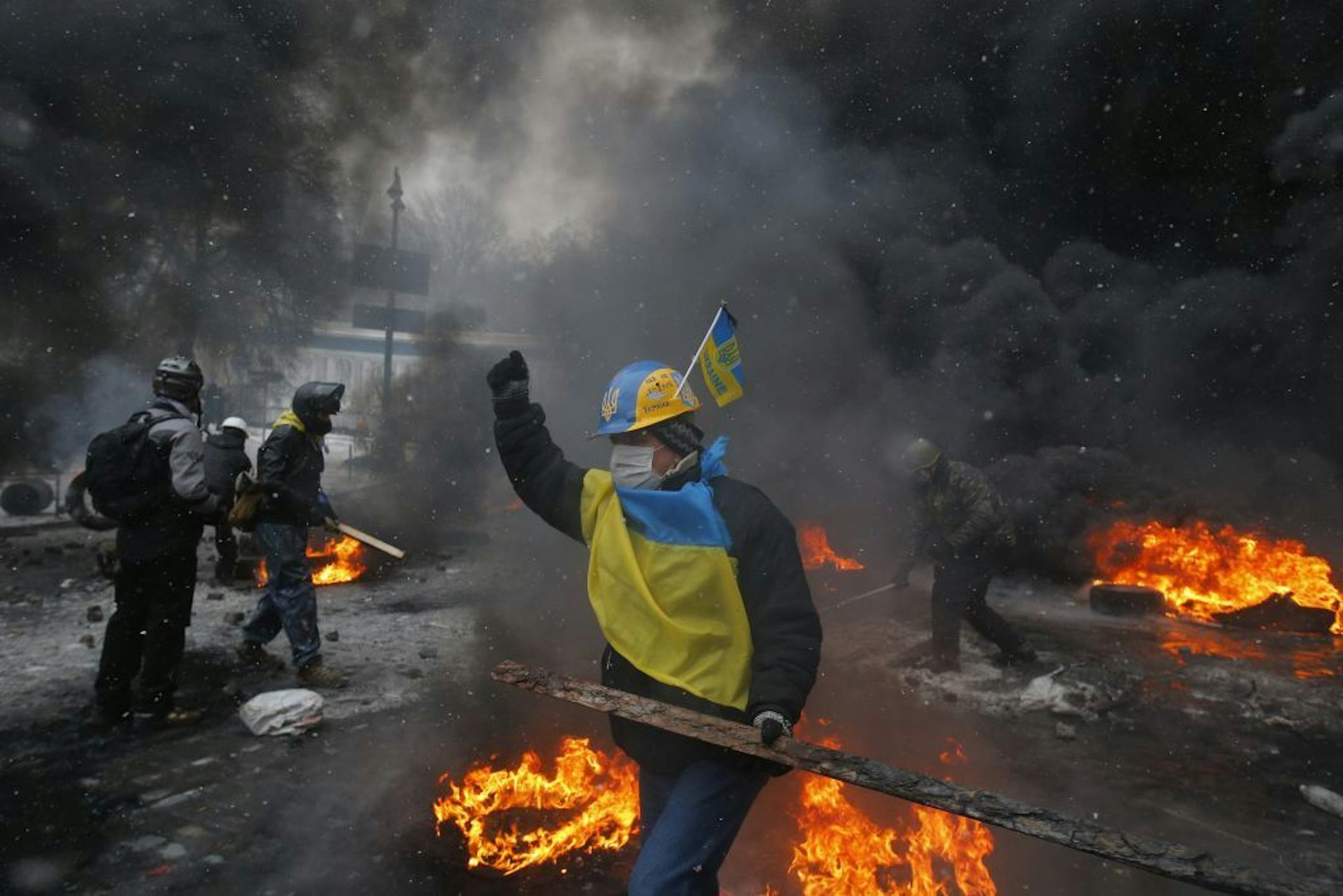 Protesters clash with police in central Kiev, Ukraine, early Wednesday, Jan. 22, 2014.