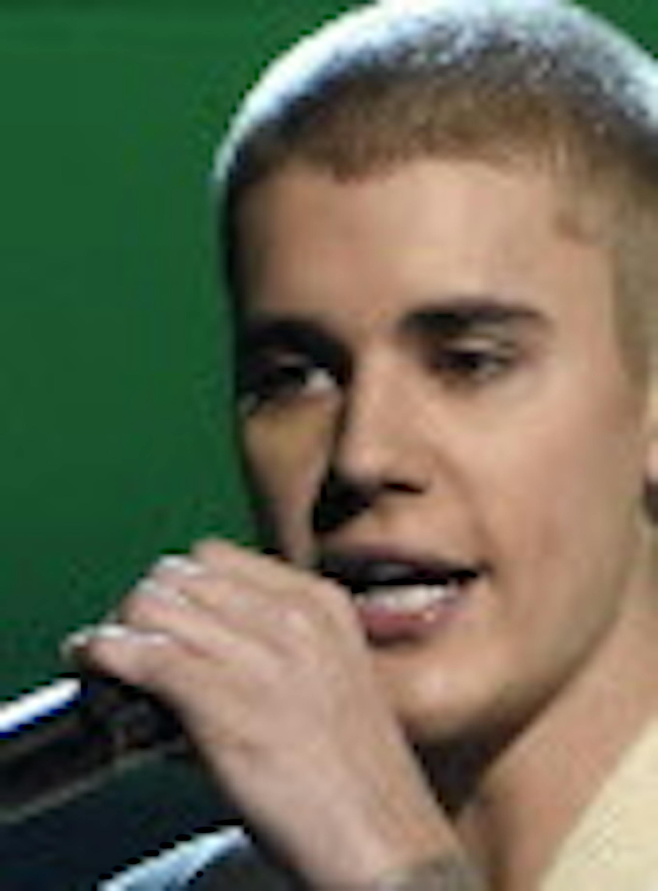 FILE - In this May 22, 2016 file photo, Justin Bieber performs at the Billboard Music Awards in Las Vegas. Bieber walked off the stage during his show in Manchester, England, Sunday after some fans ignored his request to stop screaming as he was trying to talk to the crowd in between songs. Bieber returned to the stage and told the crowd he&#xed;d stop talking and just do his musical set, because he said &#xec;Manchester just can&#xed;t handle it." (Photo by Chris Pizzello/Invision/AP, File)