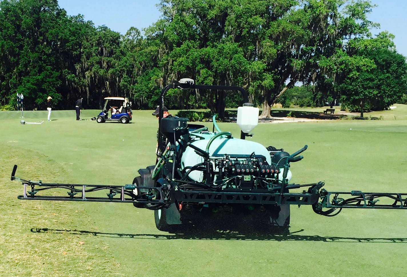 Photo courtesy of John Betts John Betts rides a Toro MultiPro 5800, equipped with a GPS tracking device (gray box on rollbar) that monitors amount of chemicals sprayed, at the Ritz Carlton Members Golf Club in Sarasota, Fla.