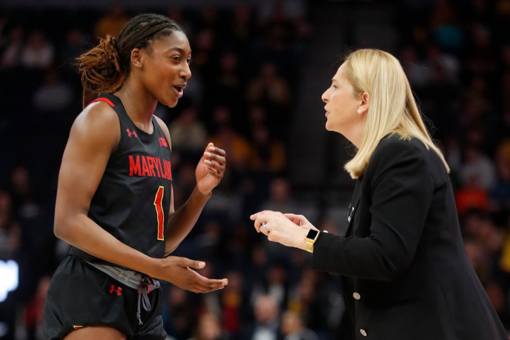 Maryland head coach Brenda Frese talks with Diamond Miller during a Big Ten women’s tournament game at Target Center vs. Iowa.