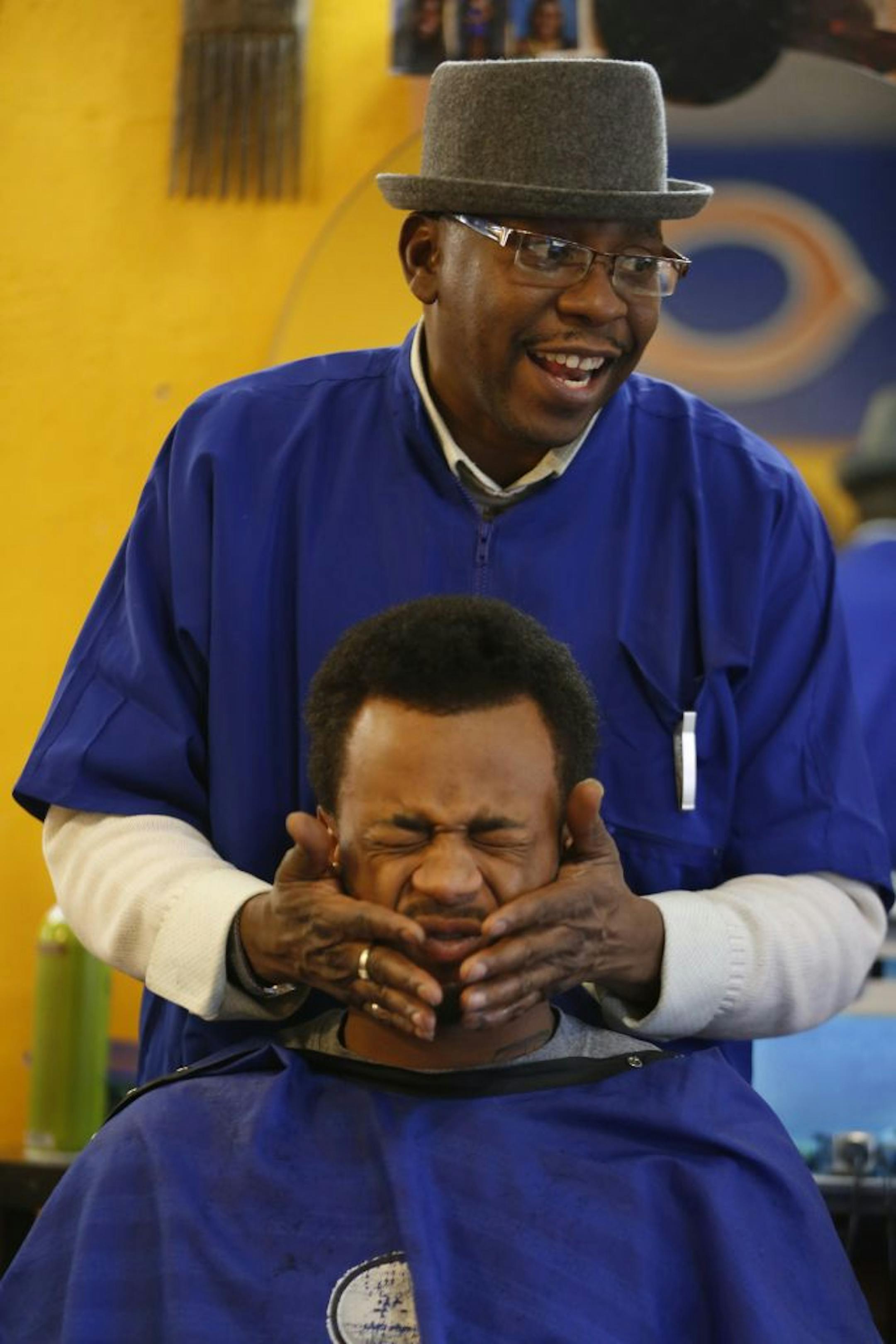 At Brian D's Old School Barbers in north Minneapolis, Dontrel Chew-McIntosh, 21, has been hearing about healthy living and safe sex from owner Brian Davis since he was a teen. He picked up some free condoms after his haircut.