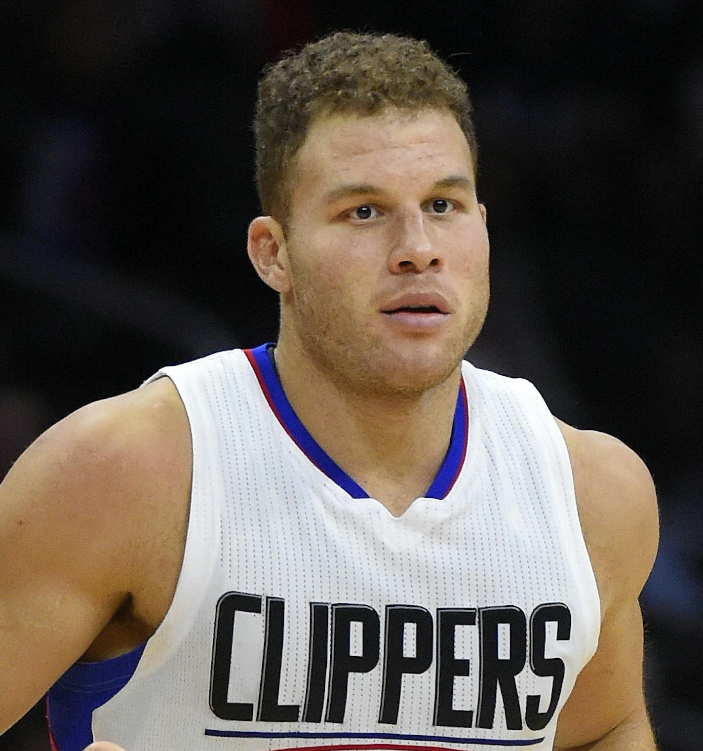 Los Angeles Clippers guard Chris Paul, right, acknowledges forward Blake Griffin after Griffin scored during the second half of an NBA basketball game against the Minnesota Timberwolves, Sunday, Nov. 29, 2015, in Los Angeles. The Clippers won 107-99. (AP Photo/Mark J. Terrill)