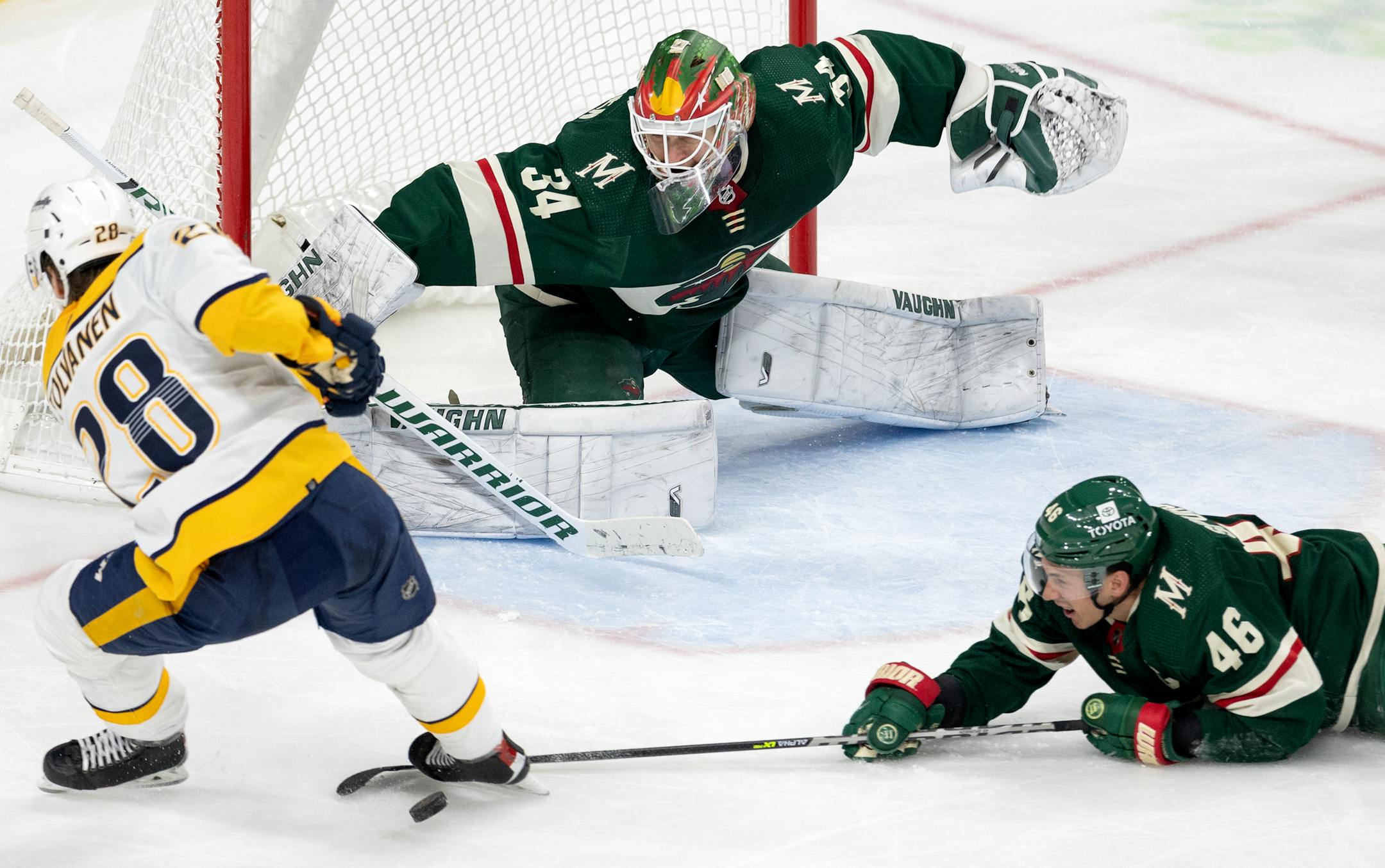 Jared Spurgeon (46) of the Minnesota Wild blocks a shot by Eeli Tolvanen (28) of Nashville Predators in the third period.