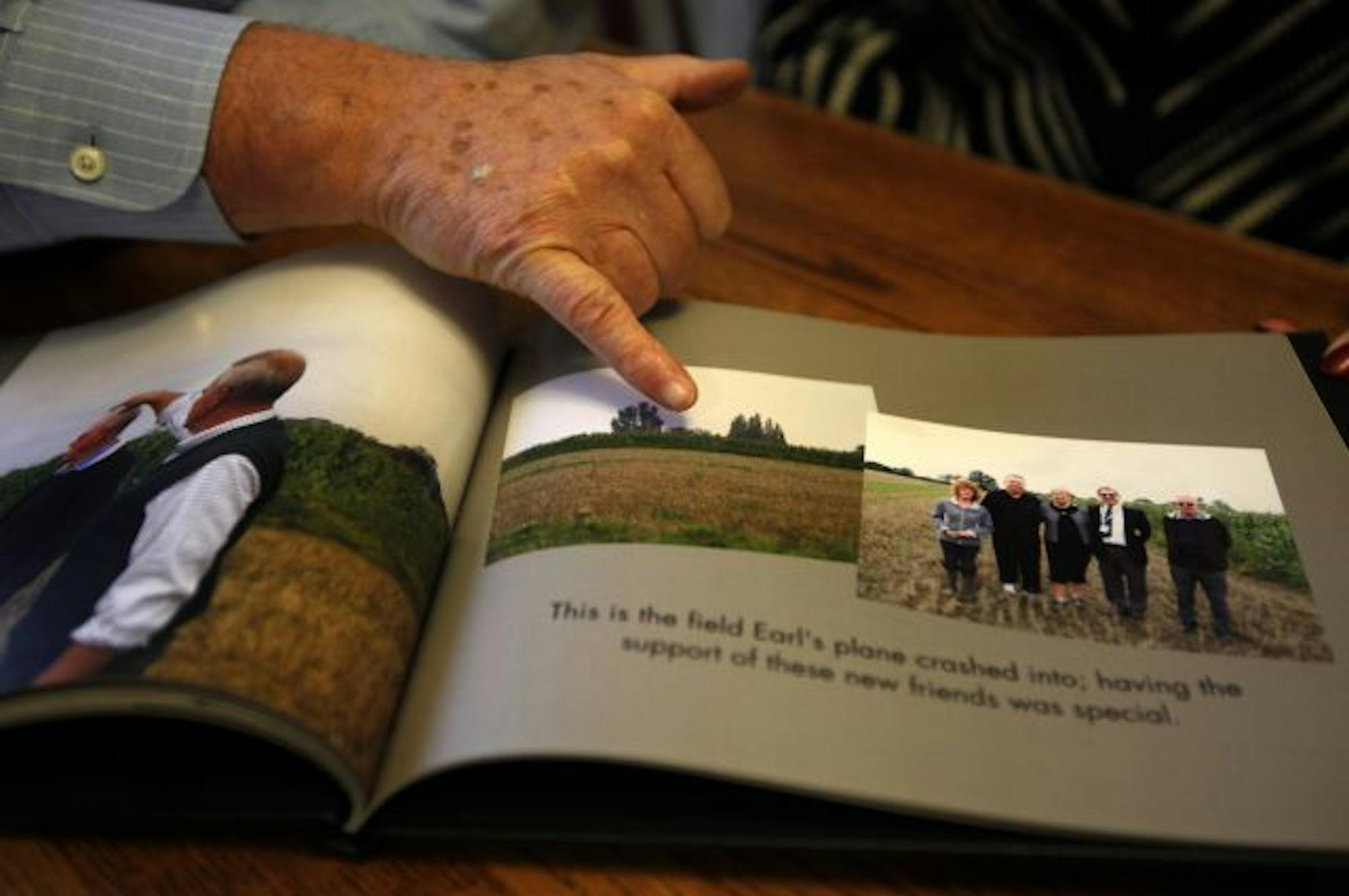 This year Steve Taylor got a huge gift: He visited a community in England that remembered his father and honored his memory. A memory book of photos shows the site where the plane went down.