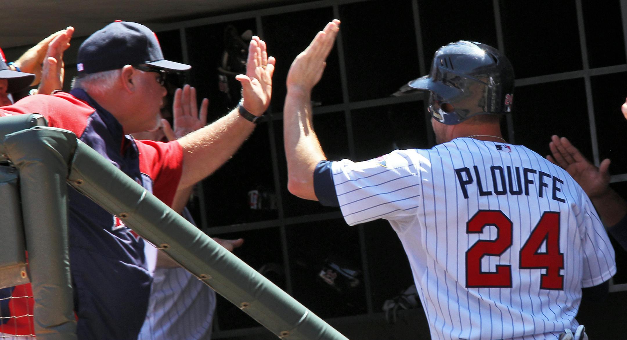 Minnesota Twins vs. Chicago Cubs. Twins manager Ron Gardenhire, left, congratulated Trevor Plouffe after he hit a home run in the 5th inning. (MARLIN LEVISON/STARTRIBUNE(mlevison@startribune.com (cq program )