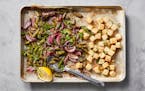 Crispy baked tofu with sugar snap peas in New York, March 28, 2023. A lacy crust of grated Parmesan makes sheet-pan tofu even crispier, Melissa Clark 