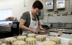 Pauline Kwan made mooncakes ahead of the lunar calendar harvest holiday that begins on Monday. Mooncakes are a specialty at the Mid-Autumn Festival an