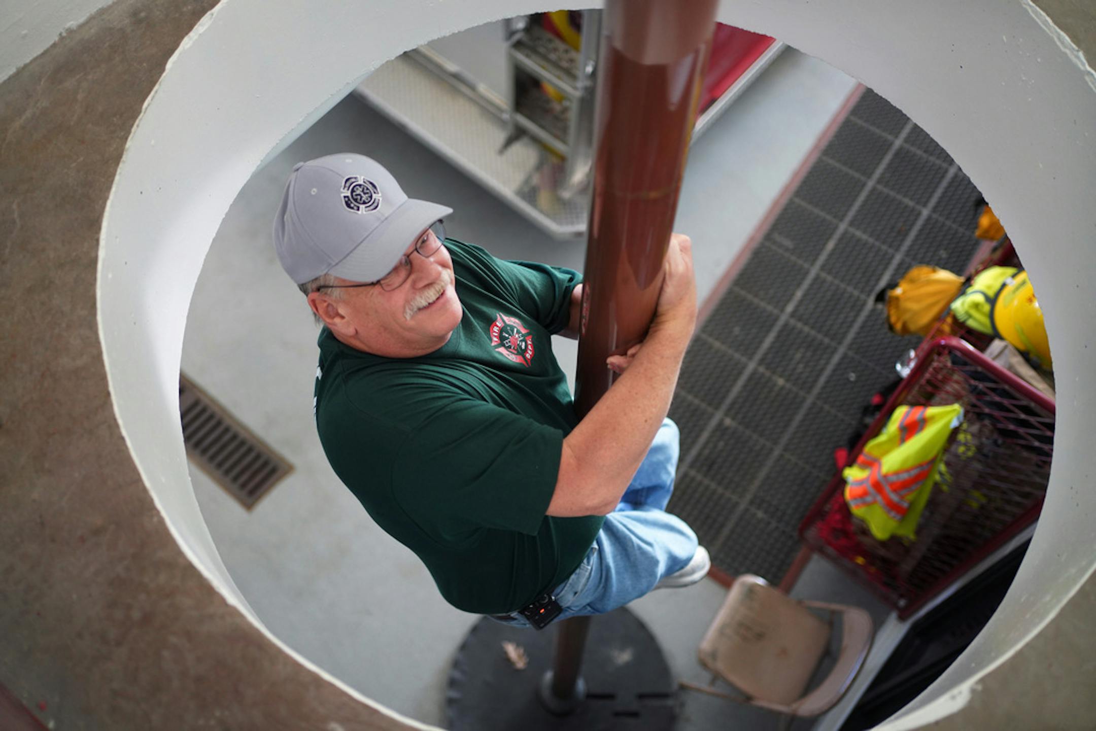Mike Kruse still slides down the department fire pole from his second-floor apartment.
