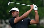 Tony Finau followed through on an approach shot at No. 9 Friday at the 3M Open at the TPC Twin Cities.