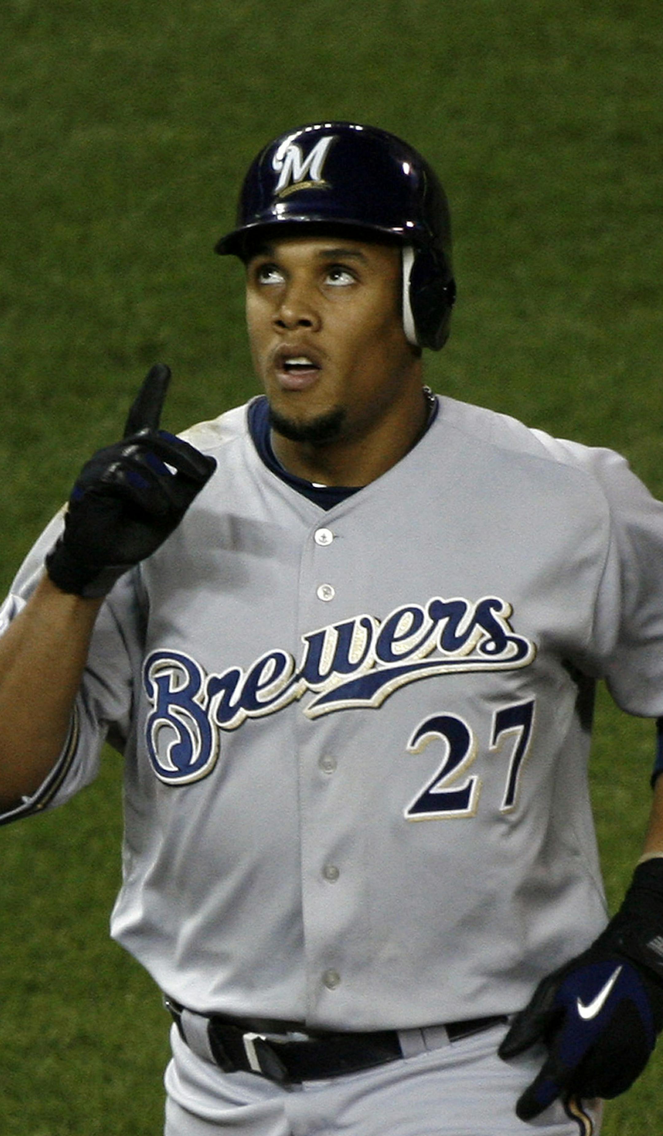 JIM GEHRZ • jgehrz@startribune.com Minneapolis/May 21 2010/7:10 PM The Minnesota Twins played the Milwaukee Brewers at Target Field Friday, May 21, 2010. IN THIS PHOTO:] Former Twins’ outfielder Carlos Gomez looked to the sky as he crossed the plate following his 8th inning home run. ORG XMIT: MIN2017021317325253