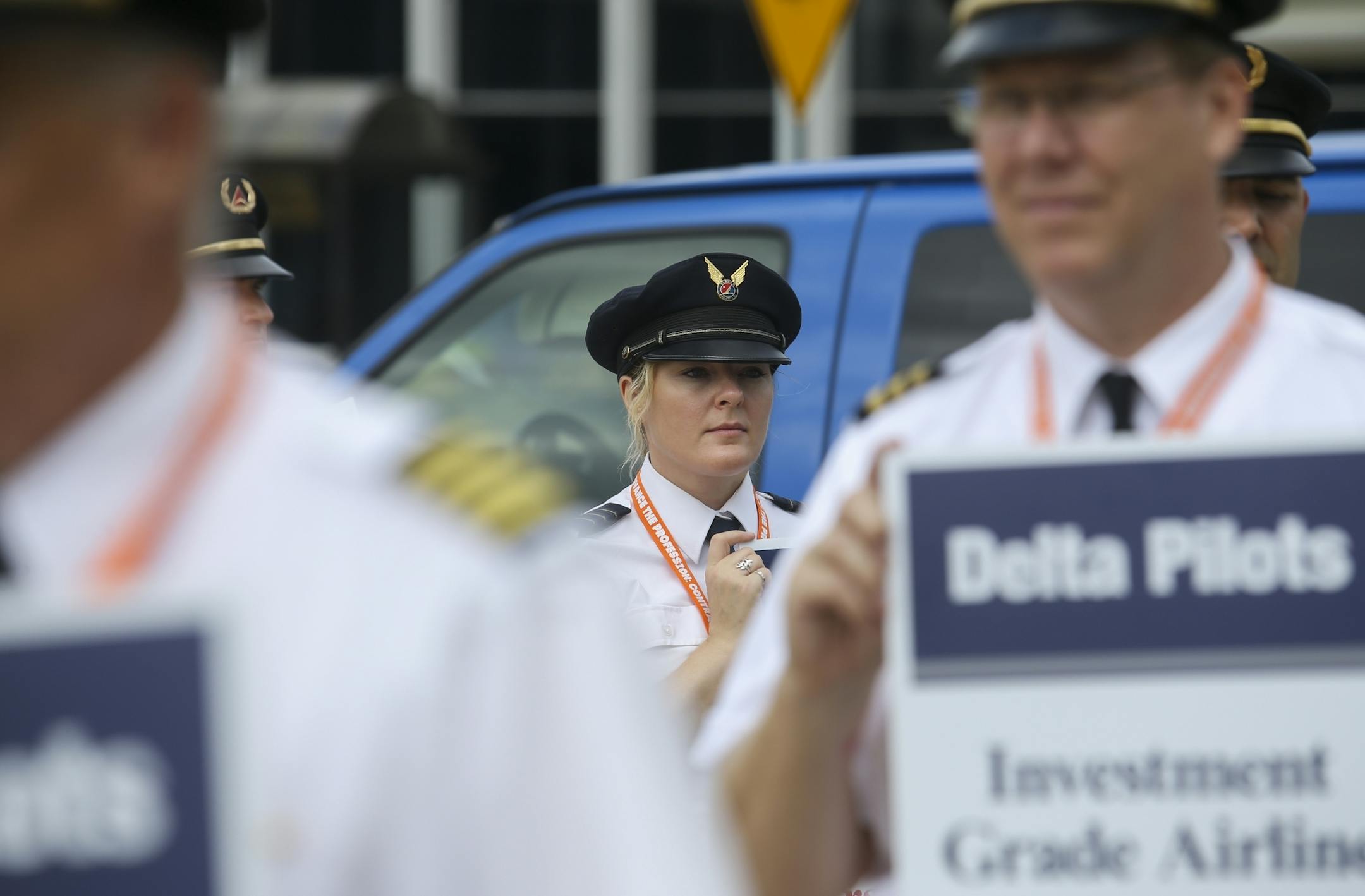 A member of Alaska Air Lines marches in solidarity with pilots form Delta Air Lines.
