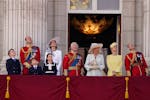 Britain's King Charles III, at centre with Queen Camilla, third right, joined by Prince George, left, Prince William, Prince Louis Princess Charlotte,