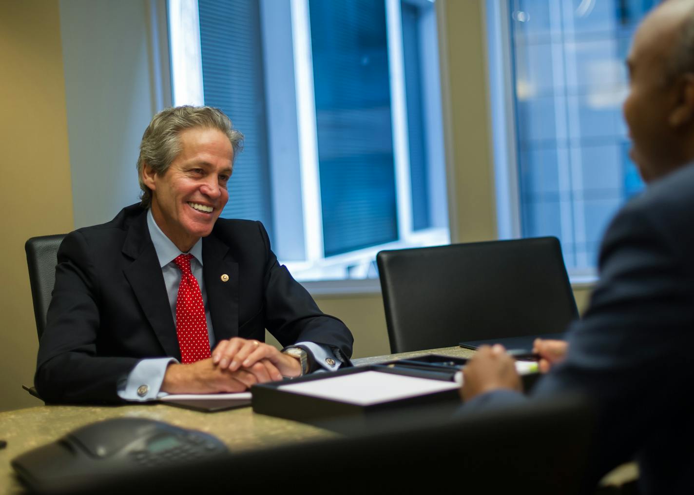 Norm Coleman meeting in his DC office with Mohamed Abdirizak. Abdul Ahmed III is also seen in the office meeting. ] Photo Credit: Charlie Archambault - Special to Star Tribune 8/6/2015 Washingnton, D.C.