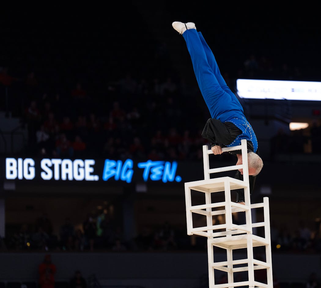 Gary Sladek, far better known as The Amazing Sladek, seen, performing his signature “Death Defying Tower of Chairs” routine has been performing for 45 years, the last decade stacking chairs in sold-out arenas.