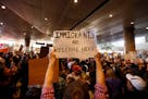 Hundreds of people protested President Trump&#xe2;&#x20ac;&#x2122;s original travel ban at LAX airport in 2017. (Genaro Molina / Los Angeles Times/TNS