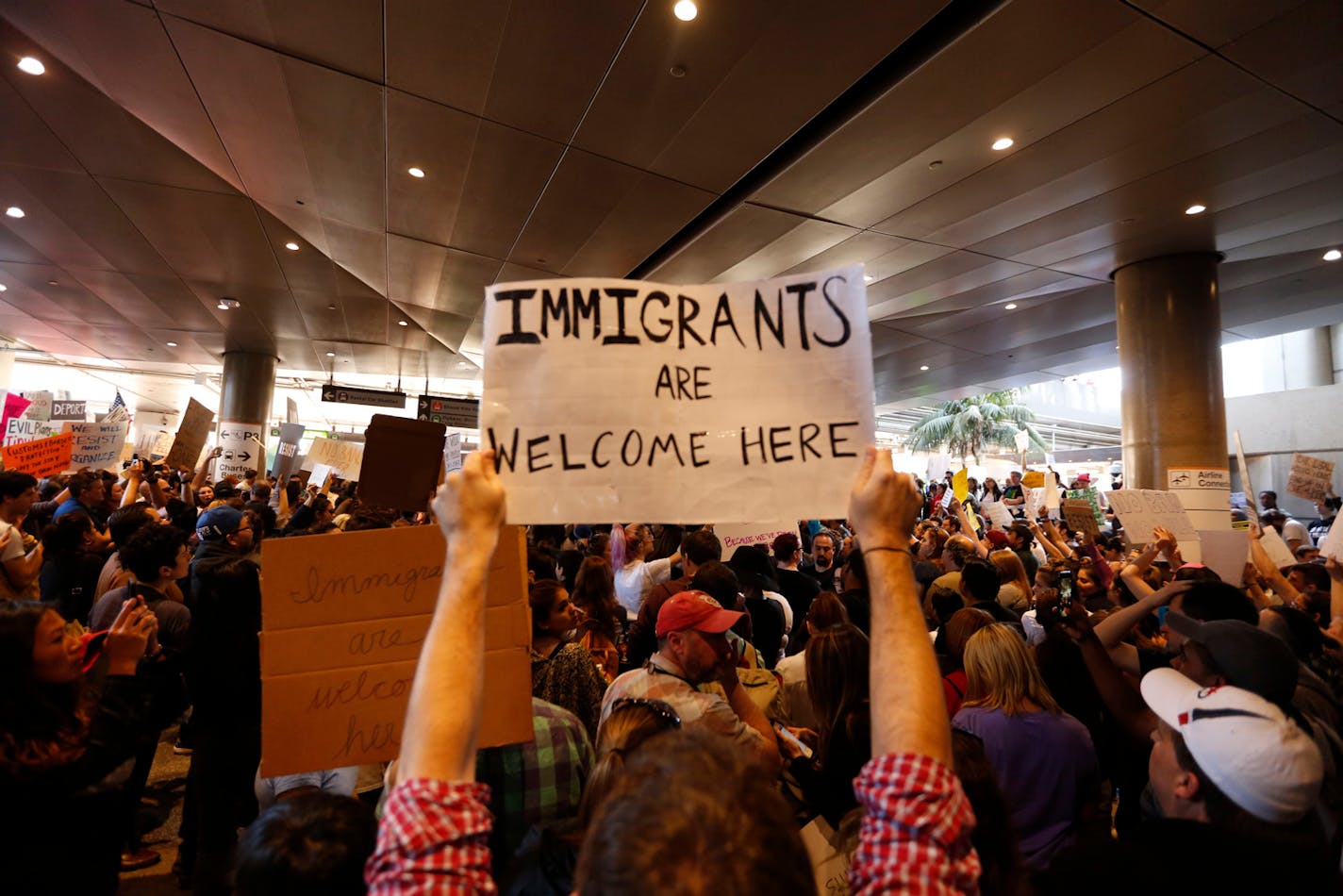 Hundreds of people protested President Trump&#xe2;&#x20ac;&#x2122;s original travel ban at LAX airport in 2017. (Genaro Molina / Los Angeles Times/TNS) ORG XMIT: 1559256