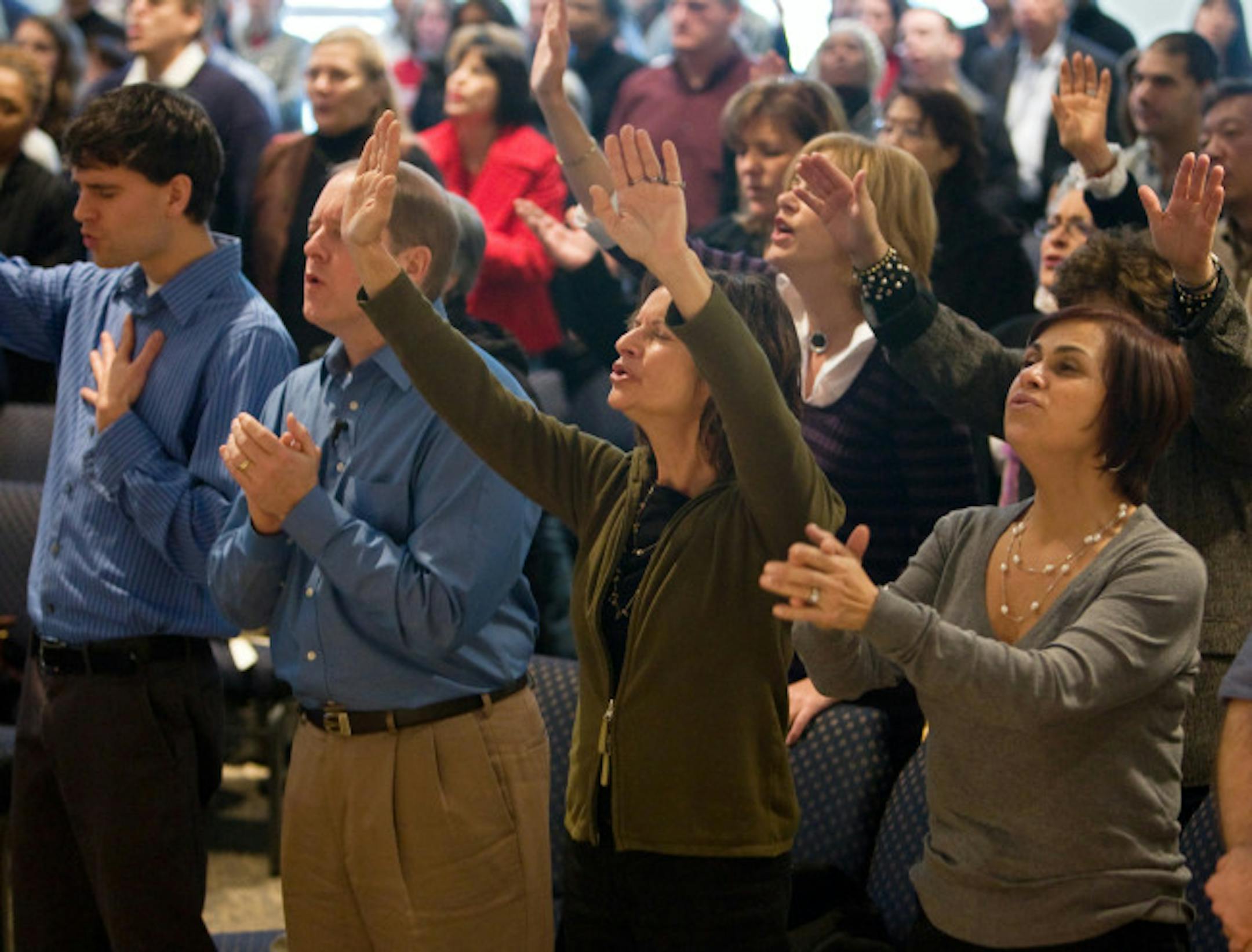 Worshipers on Sunday, Nov. 23, 2008, at Shelter Rock Church in the wealthy community of Manhasset, N.Y. Attendance is up at the evangelical church.