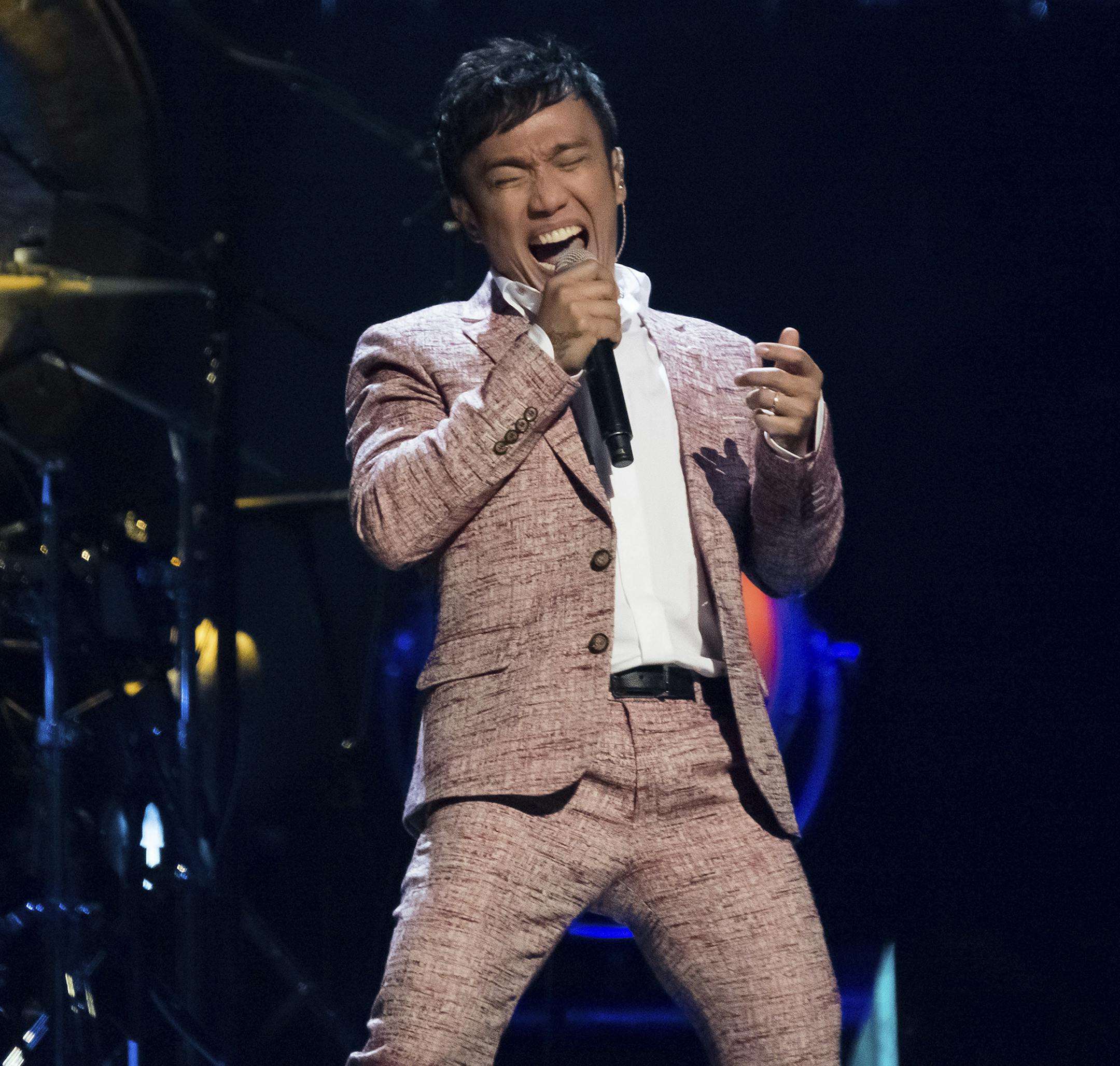 Singer Arnel Pineda performs with Journey Friday at Target Field.