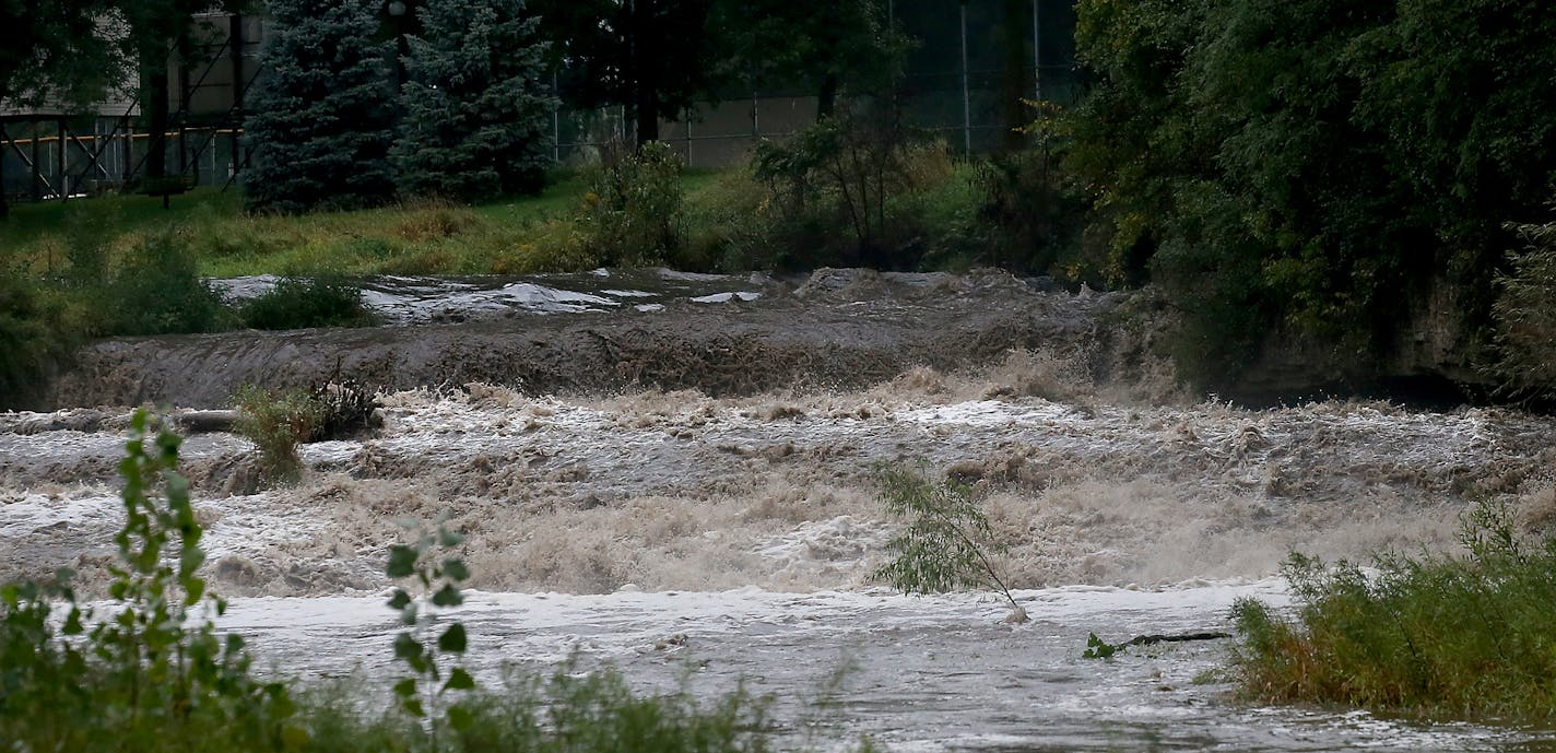 Water from torrential rains cascades over Cannon Falls on the Little Cannon River after big rainfalls Tuesday and early Wednesday, Sept. 5, 2018, in Cannon Falls, MN.] DAVID JOLES &#xef; david.joles@startribune.com Torrential rains and storms battered southeastern Minnesota overnight, soaking areas still reeling from historic flooding.