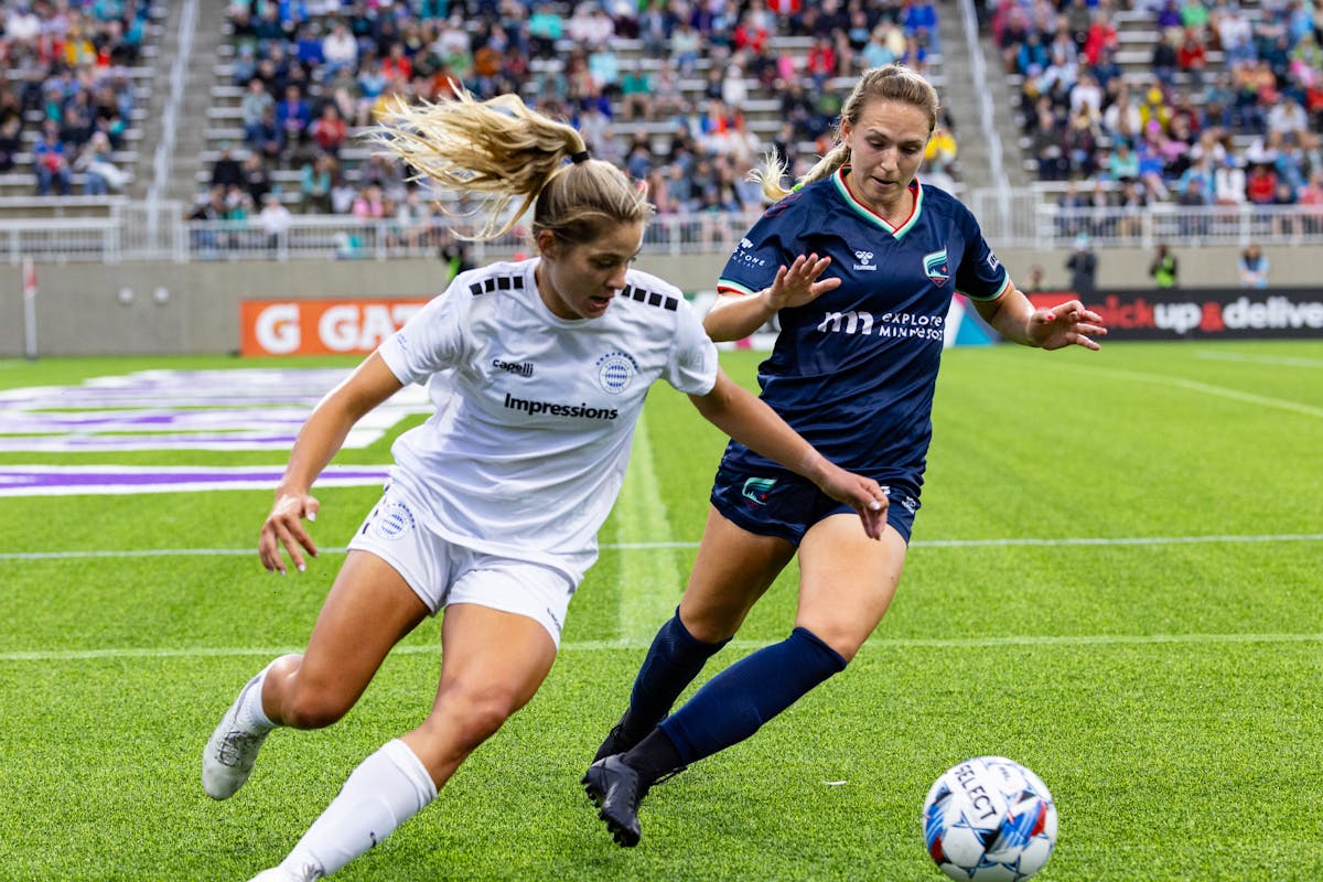 Minnesota Aurora's Sophie French, right, battles for possession with Bavarian United's Megan Cornell on June 20 at TCO Stadium. (Kelly Hagenson/Minnes