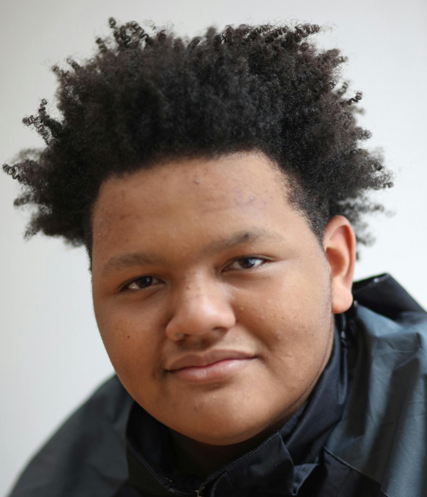 Damon Brown, 17, is a senior at Minneapolis' North High School. He is a North Side Achievement Zone scholar who plans to attend college for business and marketing and is interested in photography and sports. Brown was moved to write his senior paper on gun violence after a cousin was shot and killed. He says he is committed to working to end such violence. (Photo by David Denney, Star Tribune.)