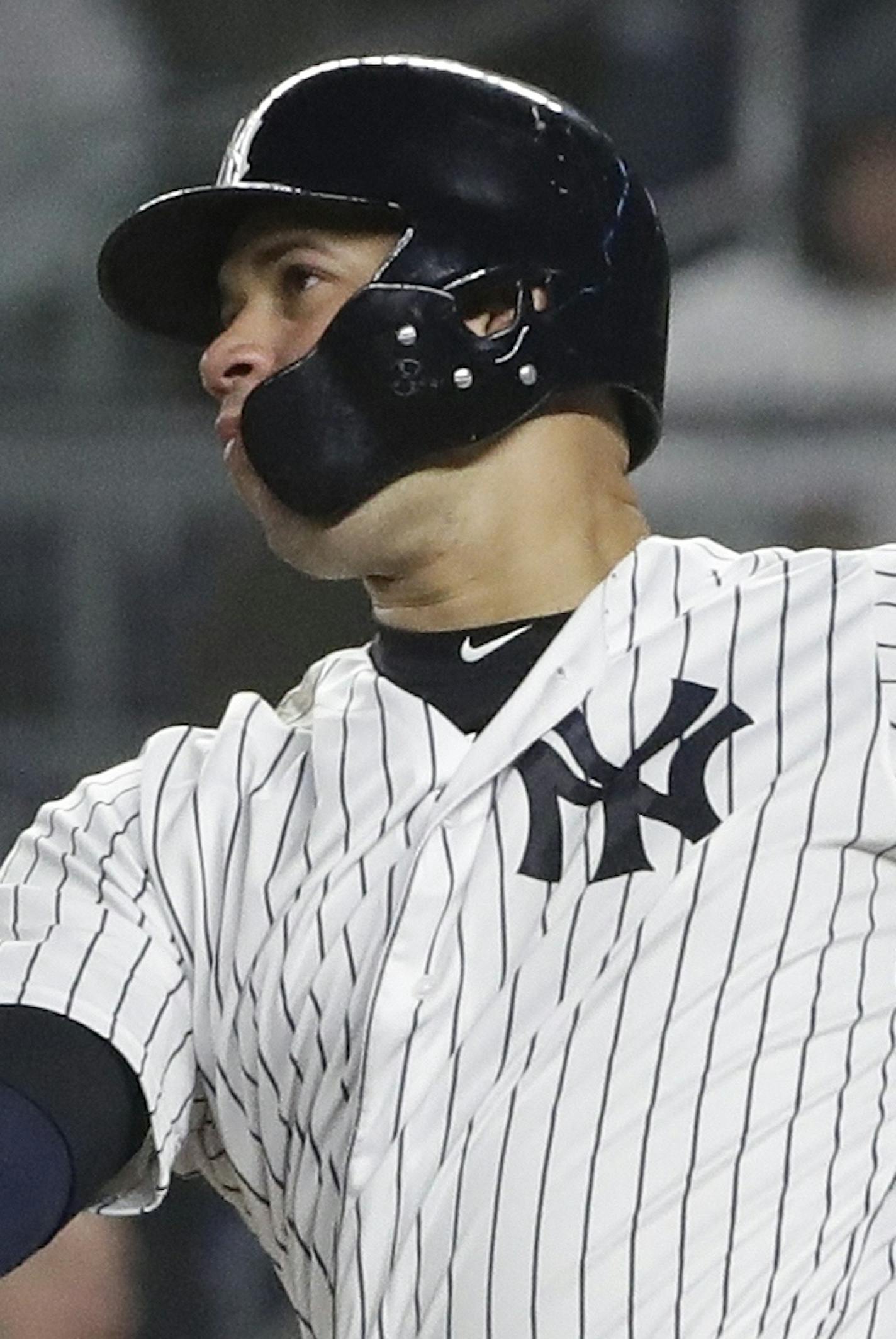 New York Yankees' Gary Sanchez follows through on a home run during the seventh inning of the team's baseball game against the Minnesota Twins on Friday, May 3, 2019, in New York. (AP Photo/Frank Franklin II)