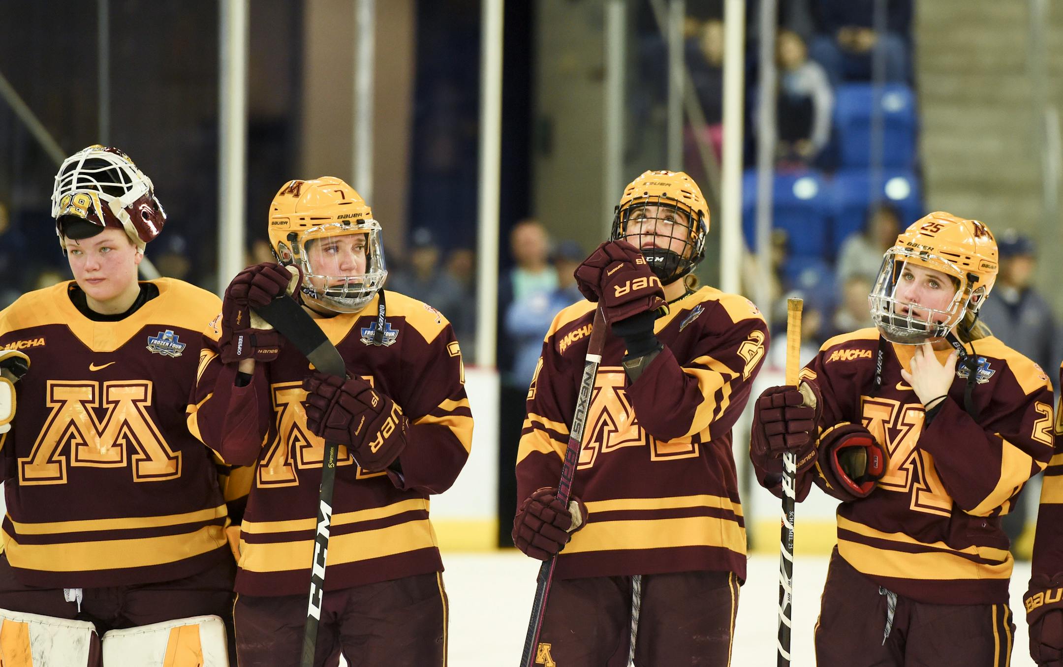 Minnesota players line up for the second-place awards after losing 2-0 to Wisconsin in the NCAA Division I women's Frozen Four hockey championship game, Sunday, March 24, 2019, in Hamden, Conn. (AP Photo/Stephen Dunn)